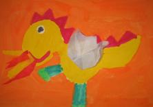 Der Drache Leandro von Kinder gemalt in Gelb, Orange und Rot